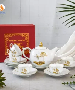 Bộ ấm chén trắng dáng mẫu đơn họa tiết hoa sen vàng kim