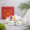 Bộ ấm chén dáng bưởi cành họa tiết mai vàng