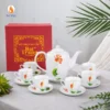 Bộ trà trắng họa tiết hoa sen hồng