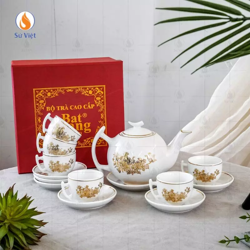 Bộ ấm chén trắng dáng bưởi cành họa tiết hoa cúc vẽ vàng kim