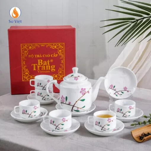 Bộ ấm chén trắng họa tiết hoa đào hồng