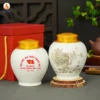 Hũ đựng chè Công uyên ương in logo Đại hội Đảng bộ