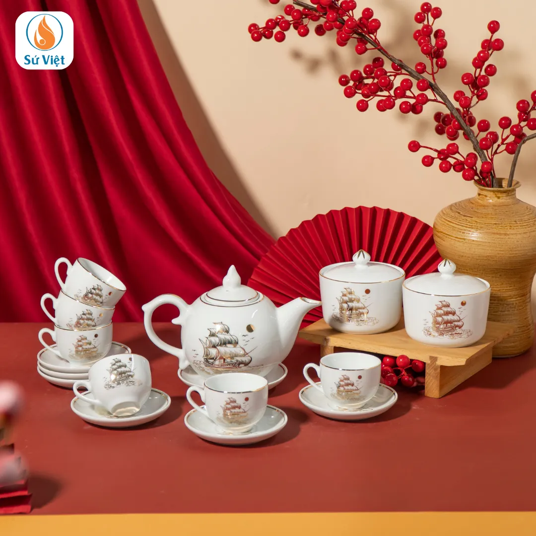 ấm chén kèm hũ mứt thuận buồm vàng kim làm quà tặng tết
